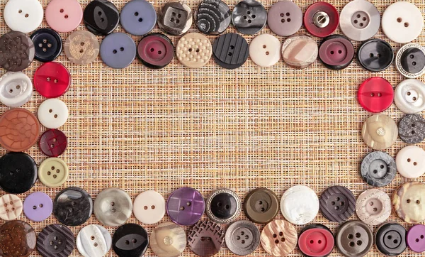 Background of buttons for clothes. Buttons of different shapes and sizes.