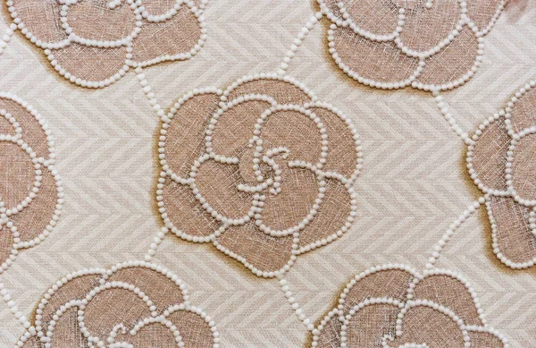 Beige porcelan stoneware tile with floral pattern. Background of porcelain stonewear tiles. — Stock Photo, Image