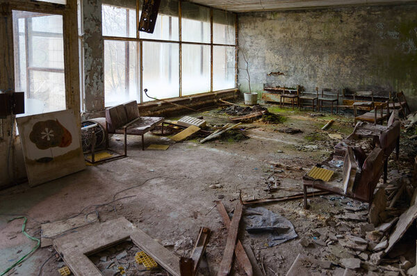 Hall in hospital No. 126, dead ghost town of Pripyat in alienation zone of Chernobyl nuclear power plant, Ukraine