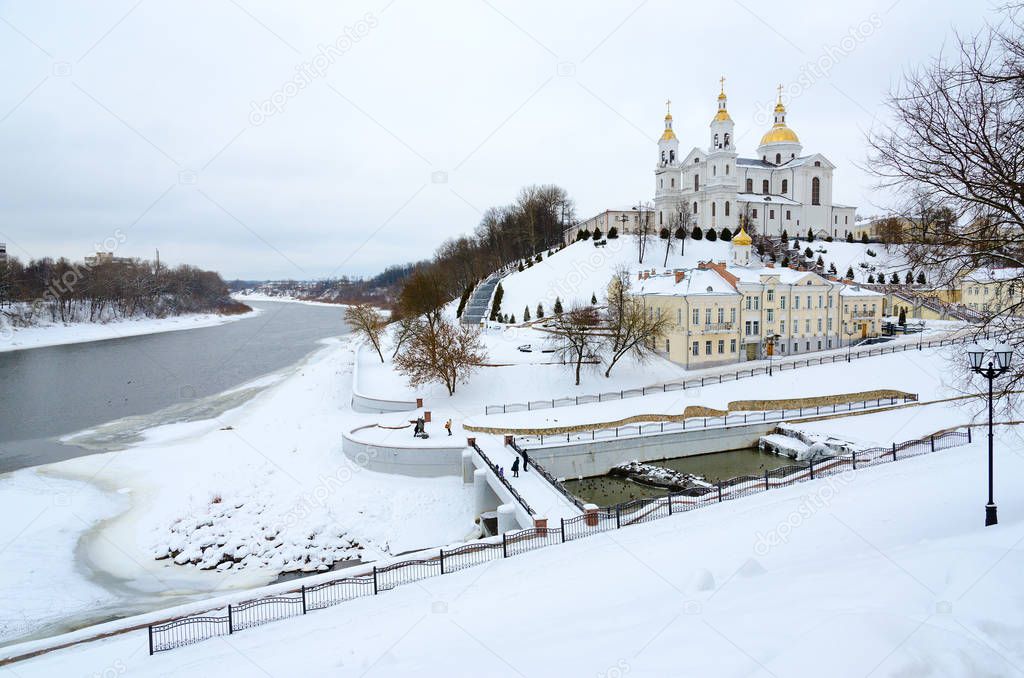 Holy Dormition Cathedral on Uspenskaya mountain at confluence of Western Dvina and Vitba rivers, winter landscape, Vitebsk, Belarus