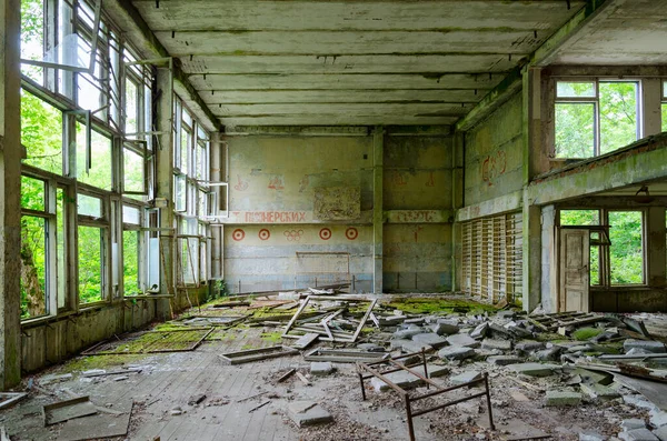 Abandoned school gym in large resettled village of Pogonnoe in Chernobyl exclusion zone, Khoiniki district, Belarus