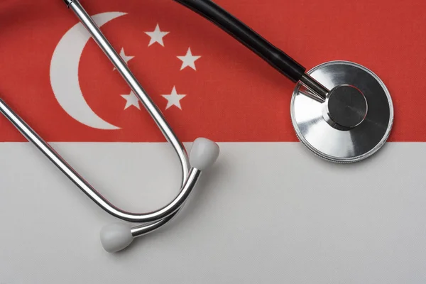 Singapore Flag Stethoscope Concept Medicine Stethoscope Flag Background — Stock Photo, Image
