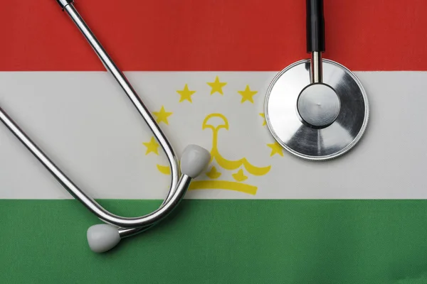 Флаге Таджикистана Установлен Стетоскоп Концепция Медицины — стоковое фото