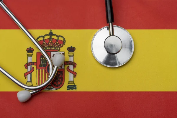 Bandeira Espanha Estetoscópio Conceito Medicina Estetoscópio Bandeira Segundo Plano — Fotografia de Stock