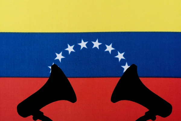 Venezuela flag and the silhouette of the speaker. — Stock Photo, Image