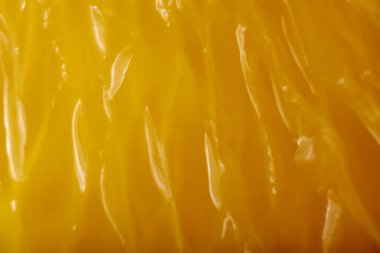 Makro fotoğrafçılıkta portakal suyu. Sağlıklı ve sağlıklı yiyecek kavramı.