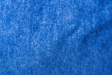 Nitel mavi kumaş dokusu. Soyut arkaplan. Kapatın. Arka planda mavi pamuk kumaş.