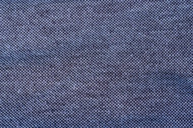 Saf pamuktan yapılmış koyu gri bir kumaşın dokusu. Pahalı ve kaliteli ürün kavramı.