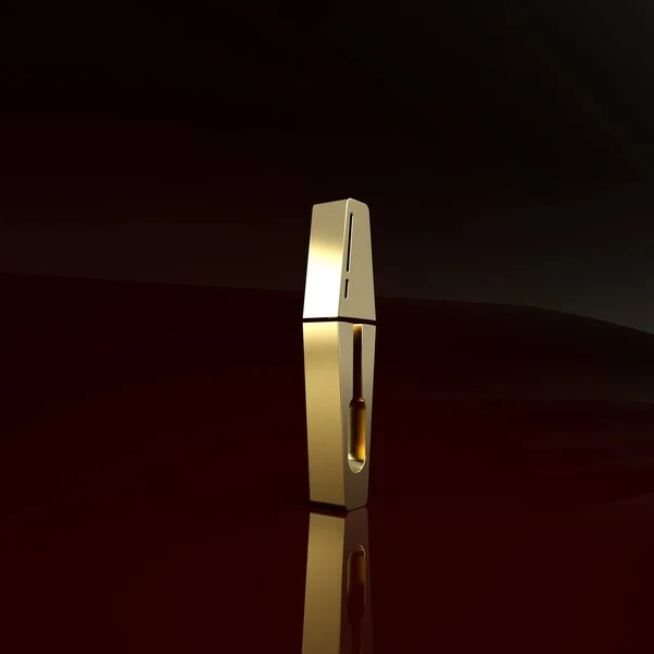 Ícone de escova de rímel de ouro isolado no fundo marrom. Conceito de minimalismo. 3D ilustração 3D render — Fotografia de Stock