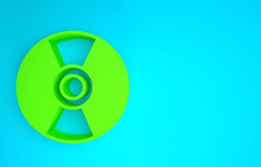 Mavi arkaplanda yeşil CD veya DVD disk simgesi izole edildi. Küçük disk işareti. Minimalizm kavramı. 3d illüstrasyon 3B canlandırma