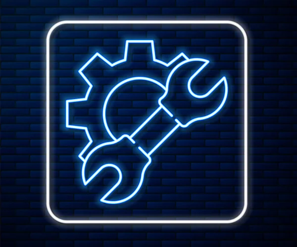 Glowing Neon Line Wrench Spanner Gear Icon Isolated Brick Wall — Stock Vector