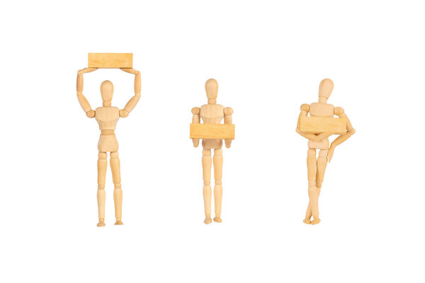 Wooden manikins human model standind and gesturing and holding wooden block  isolated on white background.