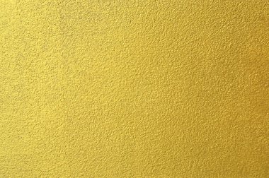 Lüks altın soyut arka plan, parlak yüzey desenli altın beton duvar.