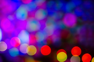 Bokeh ışıkları ve yıldız desenli şenlikli soyut arkaplan