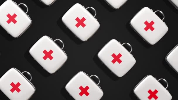 Animación Cámara Lenta Maletas Médicas Rojas Blancas Sobre Fondo Oscuro — Vídeos de Stock