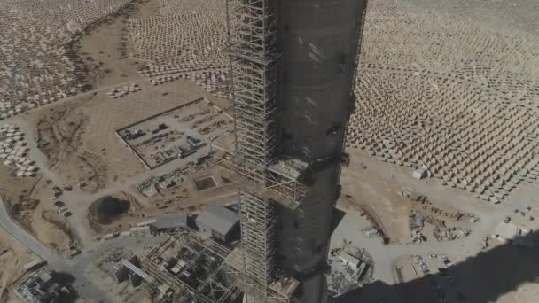 Aerial shot of industrial construction at desert Solar farm — Stock Video