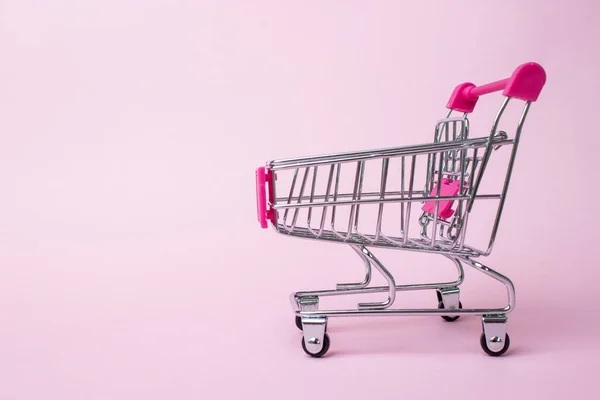 Mini Shopping Cart Sobre Fondo Rosa Pálido Negocios Concepto Comercio —  Fotos de Stock