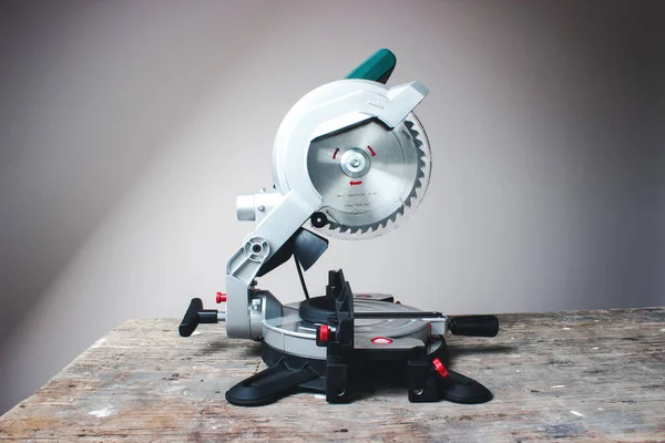Compound mitre saw. Wood and sawing machine construction ideas concept