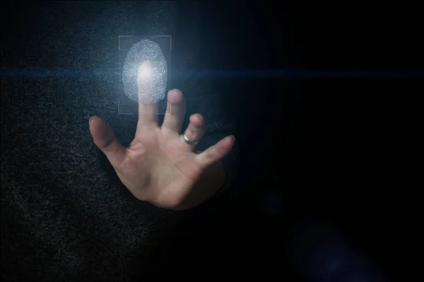 Hologram fingerprint, fingerprint scan, blue background, ultraviolet. concept of fingerprint, biometrics, information technology and cyber security