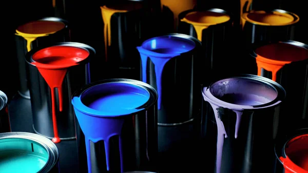 Koyu bir arka planda boya kutuları