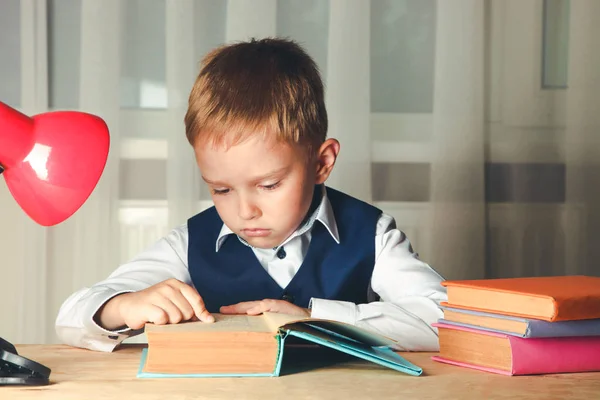 Schoolboy Sitting Table Reads Books Concept Homework — Stock Photo, Image