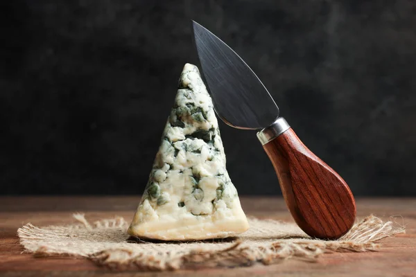 Blue Cheese Dor Blue Knife Slicing Cheese Wooden Table Black — Stock Photo, Image