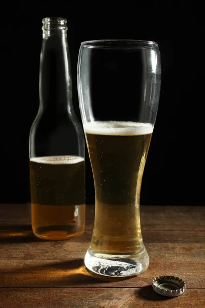 Bottle and glass with light beer — Stock Photo, Image