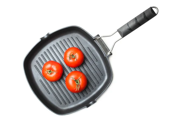 Grill pan with tomatoes — Stock Photo, Image