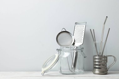 steel straws and kitchen utensils, zero waste. clipart