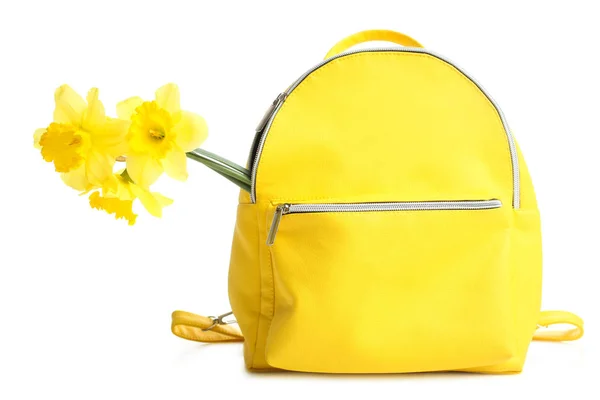 Sac à dos jaune avec bouquet de narcisse — Photo