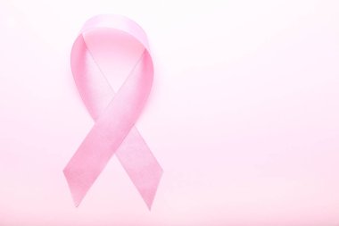 Pembe arka planda pembe kurdele. Göğüs Cance