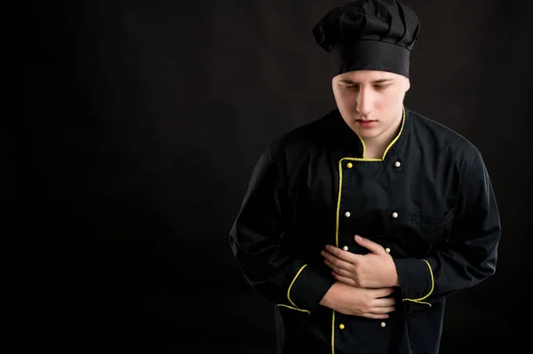 Retrato Hombre Joven Vestido Con Traje Chef Negro Tiene Dolor — Foto de Stock