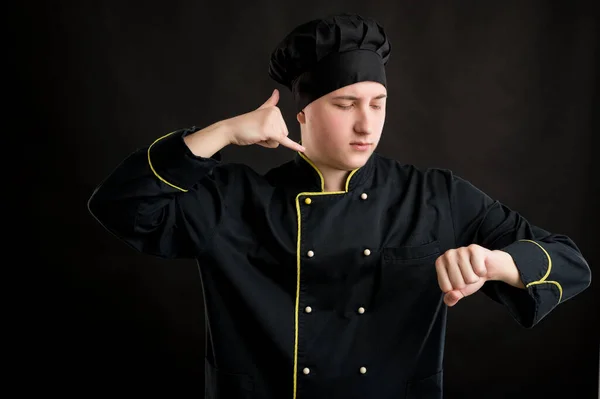 Retrato Jovem Sexo Masculino Vestido Com Terno Chef Preto Mostrando — Fotografia de Stock