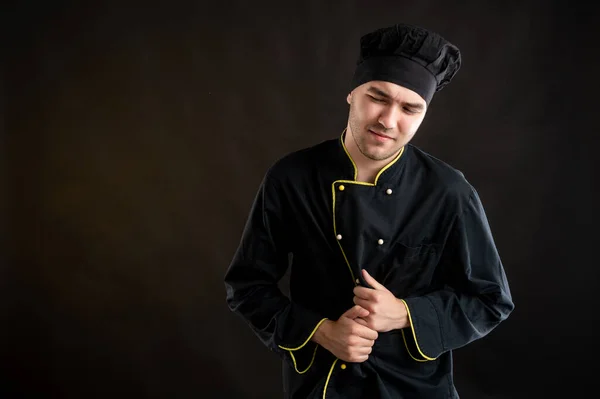 Retrato Hombre Joven Vestido Con Traje Chef Negro Tiene Dolor — Foto de Stock