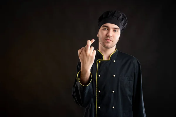 Retrato Jovem Sexo Masculino Vestido Com Terno Chef Preto Mostrando — Fotografia de Stock