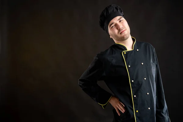 Retrato Hombre Joven Vestido Con Traje Chef Negro Tiene Dolor — Foto de Stock