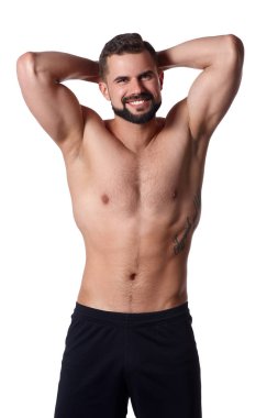 Izole arka plan üzerinde Yakışıklı kaslı adam vücudunu gösterir. Sporcuların bedeni. Spor konsepti
