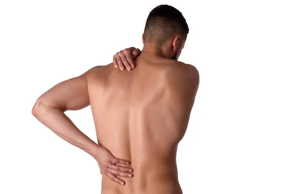 Young man with back pain. The athlete clings to a sore back. Man hurt his back. Sports medicine concept — Stock Photo, Image