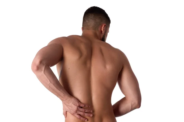 Jonge man met rugpijn. De atleet klom aan een pijnlijke rug. Man pijn zijn rug. Sportgeneeskunde concept — Stockfoto
