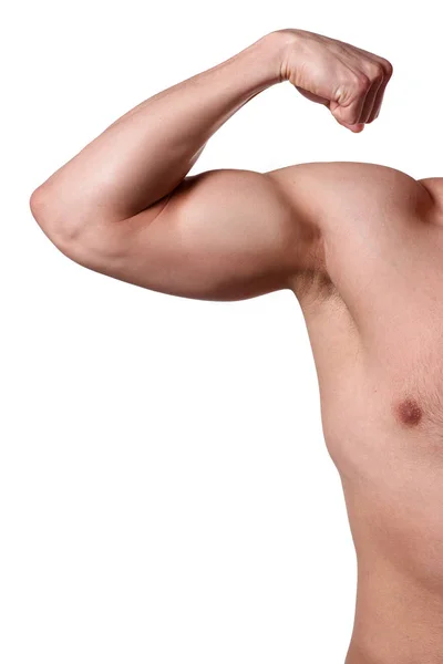 Muscular man shows his arm. Sportsman with spot body on isolated background. Sport concept — Stock Photo, Image