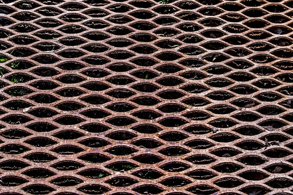 Rusty diamond mesh netting. Brown expanded metal stylish pattern