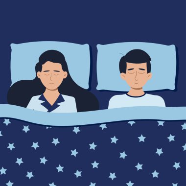 Kadın ve erkek geceleri pijamalarıyla evde uyuyor..