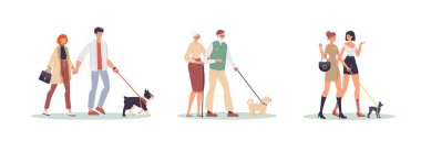 İnsanlar evcil köpek setini gezdiriyorlar.