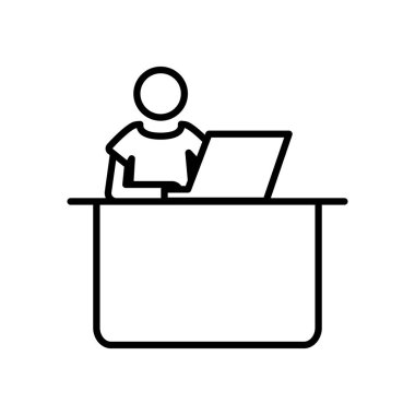 Piktogramcı ofis masasında dizüstü bilgisayarla çalışıyor.