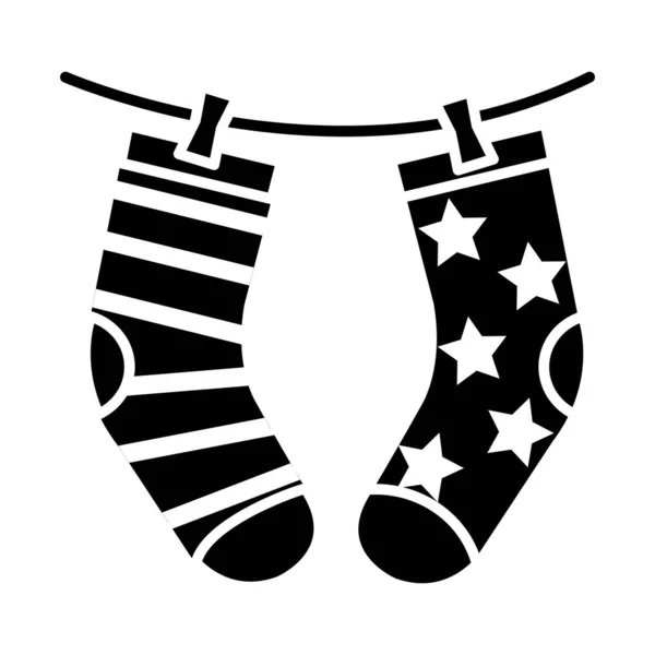 Sockor hängande med ränder och stjärnor design, silhuett stil — Stock vektor
