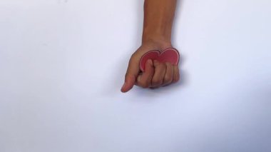 Damaged paper heart, brokenheart background footage in 4K, mental health issue