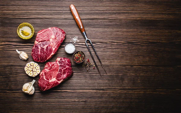 Raw Marbled Meat Steak Ribeye Rustic Wooden Background Fork Seasonings — Stock Photo, Image