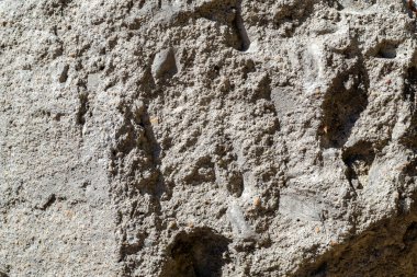 Taş yüzey dokusu - soyut arkaplan, parlak güneş ışığı