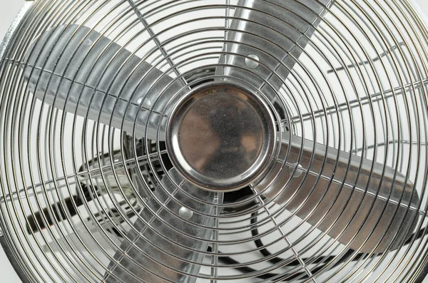 metal blades of an electric fan for cooling air