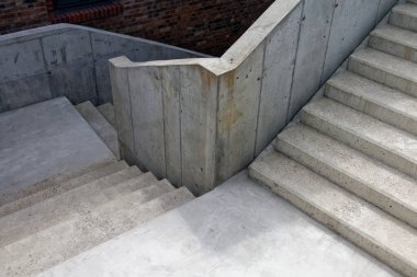Three flights of stairs and two landings in concrete. clipart